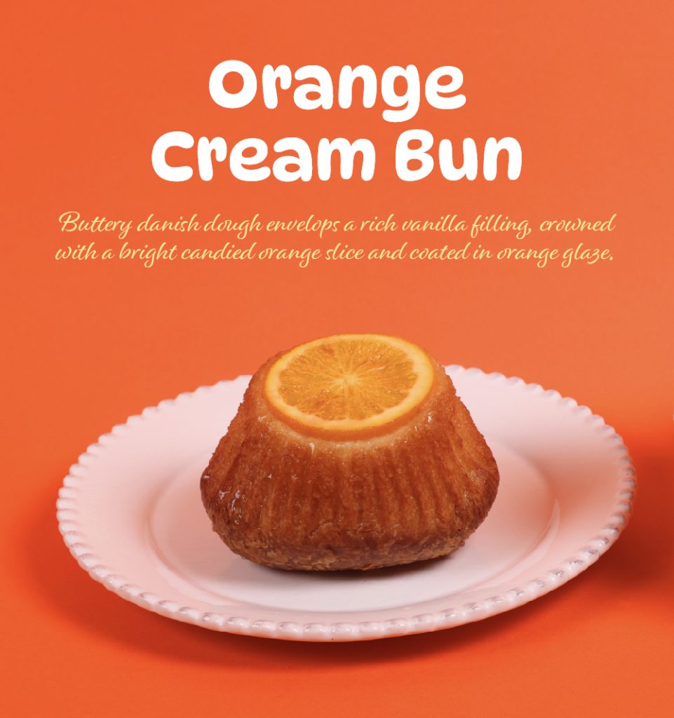 Orange Cream Bun | Buttery danish dough envelops a rich vanilla filling, crowned with a bright candied orange slice and coated in orange glaze.
